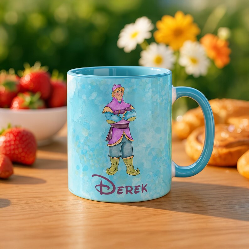 Peut inclure: Mug en c&eacute;ramique bleu clair avec une illustration de personnage de dessin anim&eacute; et le nom "Derek". La tasse a une anse et un int&eacute;rieur bleus. Id&eacute;ale pour le caf&eacute; ou le th&eacute;.
