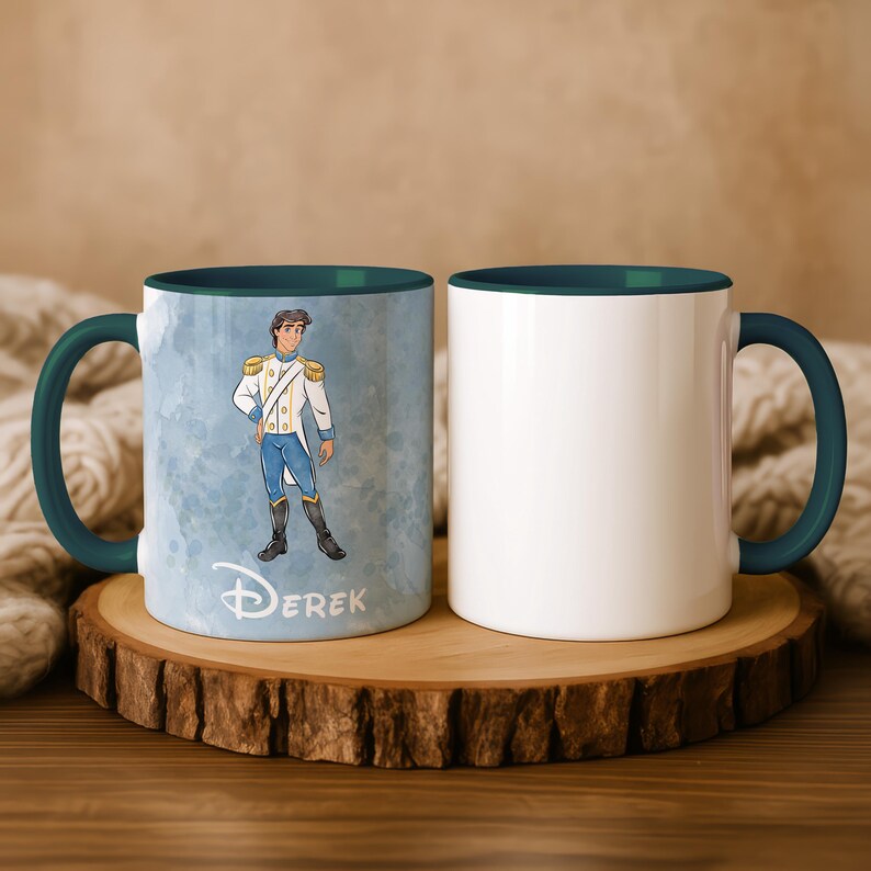 May include: Two white ceramic mugs with teal handles and interiors. One mug features a cartoon illustration of a man in a white uniform with gold accents and blue pants, with the name "Derek" below. The other mug is plain white.
