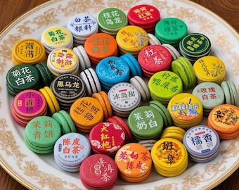 May include: A collection of round, colorful tea cakes stacked on a white plate with a gold rim. Each cake features unique Chinese characters and patterns in various colors including red, green, yellow, orange, blue, and white.