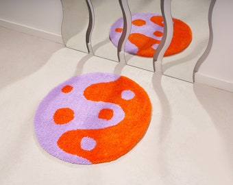 Lavender and orange tufted accent rug. Modern yin yang dot design, modern art carpet, bright, colorful, unique gift