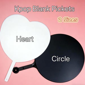 May include: Two blank Kpop pickets, one heart-shaped and white, the other circular and black. The heart picket has the word "Heart" printed on it, and the circular picket has the word "Circle" printed on it. The text "Kpop Blank Pickets" and "2 Sizes" are also visible.