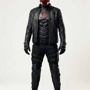 Red Hood inspired cosplay, premium leather jacket, Jason Todd, Gotham City fashion, comic book costume, superhero apparel, anti-hero aesthetic, high detail armor, convention outfit, cosplay photography, luxury cosplay gear, red bat logo, tactical style jacket, mens hero suit, realistic costume, high quality materials, detailed stitching, embossed logo, layered body armor, utility straps, premium craftsmanship, cosplay collector.
