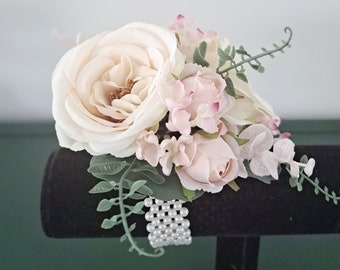 Pink and cream ladies wrist corsage. Faux flowers. High school formal, dance, prom. Wedding, mother of the bride, flower wrist corsage.