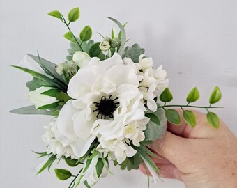 White faux floral wrist corsage. Black & white Anemone. High school formal, dance, prom. Wedding, mother of the bride, flower wrist corsage