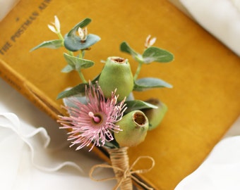 Buttonhole, Boutonniere for groom, groomsmen, men.  Wedding, special occasion buttonhole. Flowering Eucalyptus, gum blossom, gumnut, foliage