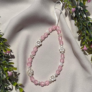 May include: A rustic wooden sign with the text "Welcome to our home" in white lettering. The sign features a distressed finish and a simple, inviting design, perfect for entryway decor.