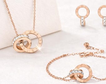 Rose Gold 18k Interlocking Ring Jewelry Set, Roman Numeral Crystal Pendant Necklace Bracelet Earrings