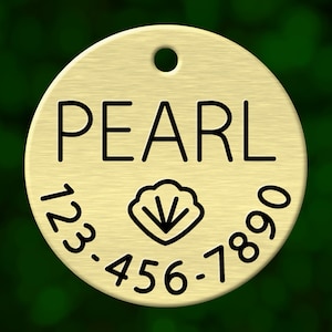 Custom seashell dog tag. Round pet ID name tag personalized with deep engraving. Handmade pet product. Unique pet gift.