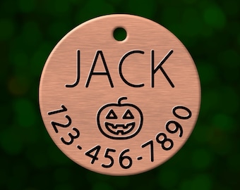 Custom Halloween jack o'lantern dog tag. Round pet ID name tag personalized with deep engraving. Handmade pet product. Unique pet gift.