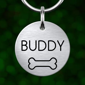 Custom bone dog tag. Personalized pet ID with deep engraving. Made in Oregon.