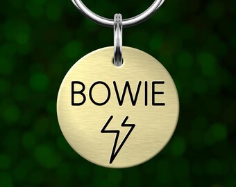 Custom lightning bolt dog tag. Personalized pet ID with deep engraving. Made in Oregon.