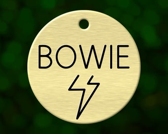 Deep engraved custom dog tag. Personalized round pet name tag for dog collar. Made in the USA.