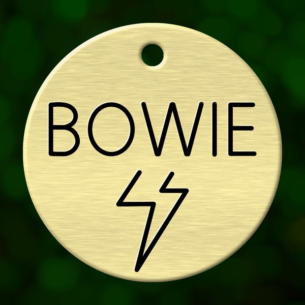 Deep engraved custom dog tag. Personalized round pet name tag for dog collar. Made in the USA.