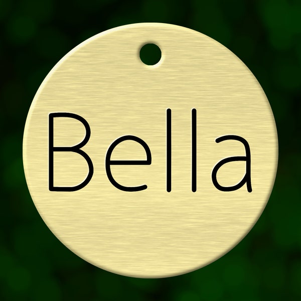 Deep engraved custom dog tag. Personalized round pet name tag for dog collar. Made in the USA.