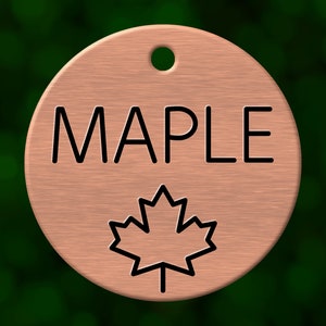 Custom maple leaf dog tag. Round pet ID name tag personalized with deep engraving. Handmade pet product. Unique pet gift.