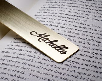 Personalized metal bookmark with name deeply engraved in solid brass. Made in Oregon.