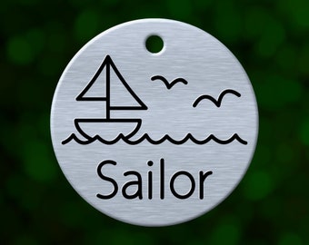 Custom sailboat dog tag. Round pet ID name tag personalized with deep engraving. Handmade pet product. Unique pet gift.