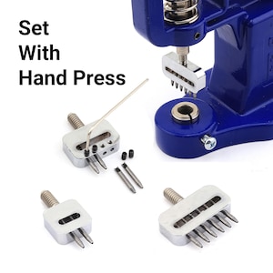 May include: A blue hand press set with several silver attachments and tools. The text "Set With Hand Press" is visible. The set includes various punch heads and accessories for crafting or repair. Metric measurements are used.