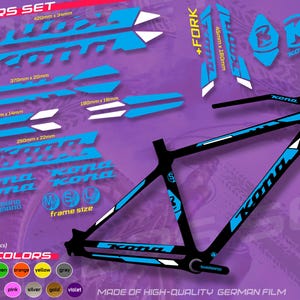 May include: A sticker set for a Kona bicycle frame, featuring blue and white decals. The set includes frame stickers, fork stickers, and bonus protective stickers. The text on the stickers reads "Kona" and "Shimano". The stickers are waterproof and sun-resistant.