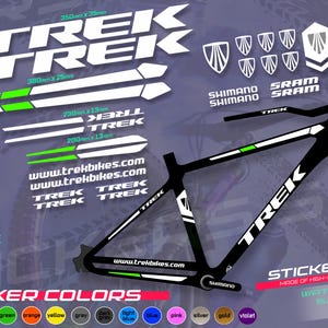 May include: A black and white Trek bicycle sticker set with green accents. Includes various Trek logos, frame decals, and Shimano and SRAM branding. The set also features the text "www.trekbikes.com" and "STICKERS SET".