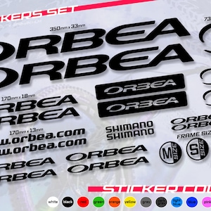 May include: A sticker set featuring the brand name "ORBEA" in various sizes and styles, along with "SHIMANO" and website text. Includes black stickers with dimensions in millimeters, and color options. The set is waterproof and easy to apply.