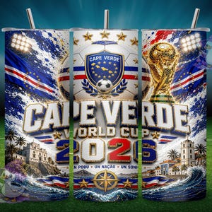 May include: A cylindrical tumbler featuring a Cape Verde World Cup 2026 theme with a soccer ball, the Cape Verde national emblem, a gold trophy, stadium lights, ocean waves, and coastal architecture. The text reads Cape Verde World Cup 2026.