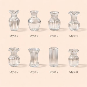 May include: A collection of eight clear glass vases in various styles. Each vase has a unique shape, including fluted, rounded, and cylindrical designs. The vases are labeled with the text "Style 1" through "Style 8".