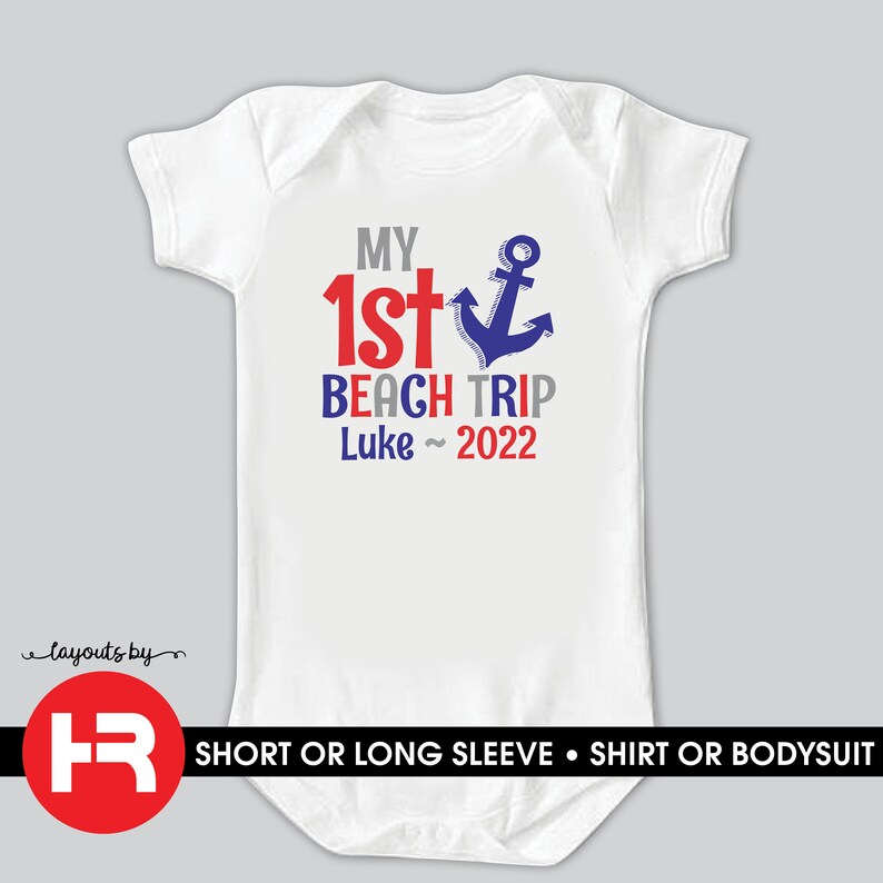 May include: White baby onesie with red, blue, and gray text that reads "My 1st Beach Trip Luke~ 2022". A blue anchor graphic is next to the text.