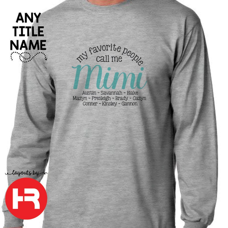 May include: Gray long-sleeve shirt with the text "my favorite people call me Mimi" in teal blue lettering. Below the text are the names Austin, Savannah, Blake, Masyn, Presleigh, Brady, Casyn, Conner, Kinsley, and Gannon.