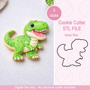 May include: A green dinosaur cookie decorated with white teeth, a pink mouth, and a yellow cookie base. The image also shows a cookie cutter outline and text that reads "Cookie Cutter STL FILE Green Dino".