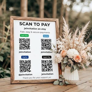 May include: A rectangular wooden frame holds a white sign with the text SCAN TO PAY, jeinvitation on etsy, and Fast, easy & secure payments. It features four QR codes for Cash App, Venmo, PayPal, and Apple Pay with associated usernames.