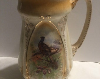 Vintage brown pheasant ceramic pitcher with metal lid