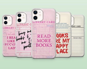 May include: A collection of five phone cases with library card designs. The cases are pink and white, with phrases like "Read More Books" and "Books Are My Happy Place" in black and red text. Each case has a different design.
