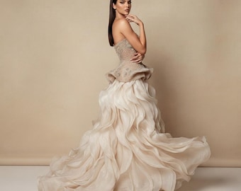 Champagne Strapless Embellished Couture Gown: Crystal Beaded Bodice, Sculptural Peplum & Flowing Ivory Petal Skirt