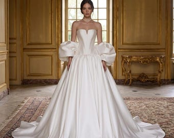 Ivory Satin Wedding Gown: Strapless Corset Bodice, A-Line Ball Dress with Dramatic Back Detail