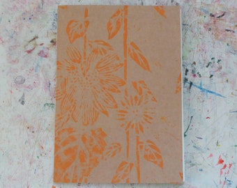Orange sunflower lino print hand bound A5 kraft notebooks/sketchbooks