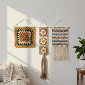 May include: A white ceramic mug with a black handle and the text "But First, Coffee" in a black, handwritten-style font. The mug is on a white surface.