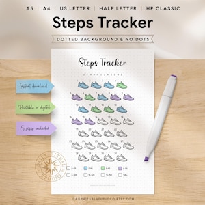 May include: A white printable "Steps Tracker" with a dotted background, featuring a grid of shoe illustrations in various colors. The text "Steps Tracker" is at the top. A white marker with a purple tip rests on the page. Includes the text "Instant download", "Printable or digital", and "5 sizes included".