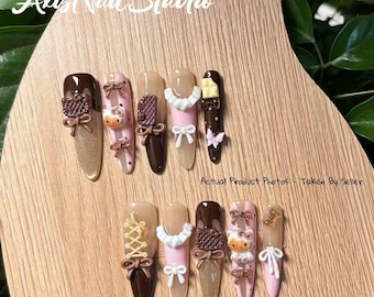 Unghie finte a forma di fiocco 3D / Unghie finte lunghe a mandorla color cioccolato kawaii