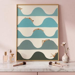 May include: A framed rectangular wall art print featuring a repeating pattern of stylized waves in shades of blue and green. The design includes small figures in orange swimwear positioned along the crests of the waves against a cream background.