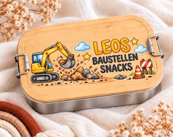 Fiambrera personalizada para niños con nombre: acero inoxidable, tapa de bambú y diseño de vehículo.