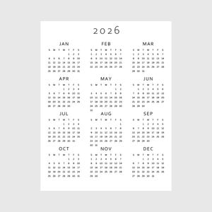 May include: A minimalist 2026 calendar printed on white paper. The calendar displays all twelve months with each month's days arranged in a grid format, starting with Sunday and ending with Saturday.