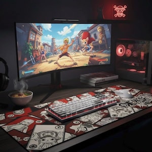 May include: A gaming setup featuring a curved monitor displaying a colorful anime scene. A white keyboard, mouse, and a red and white mousepad with anime graphics are on the desk. A computer tower with red lights and headphones complete the setup.