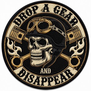 May include: A circular embroidered patch featuring a skull wearing a vintage motorcycle helmet with goggles. Behind the skull are two crossed pistons with flames. The text reads DROP A GEAR AND DISAPPEAR in a bold, dark font on a tan background.