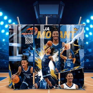 May include: A stainless steel tumbler featuring a collage of images of basketball player Ja Morant. The design includes the words "JA MORANT" and "GRIZZLIES" with a basketball court background. The tumbler has a silver straw.