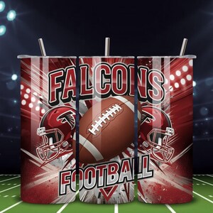 May include: A set of three stainless steel tumblers with lids and straws. Each tumbler features a red and white design with the word "FALCONS" and "FOOTBALL", a football, and a football helmet.