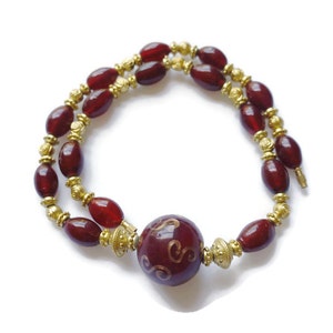 22 Inches red oval glass bead necklace with round bead pendant