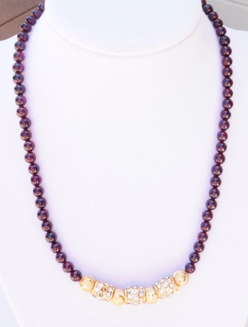 16 Inches Necklace With Gold Beads and Rhinestone Beads in the