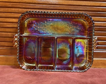 Amber glass divided serving tray with bright iridescent hues of purple and gold