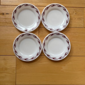 May include: A set of three ceramic mugs with a speckled, matte finish. The mugs are in shades of cream, light gray, and dark gray. Each mug has a simple, minimalist design, perfect for coffee or tea.